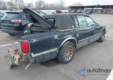 1991 Lincoln Town Car Signature z USA, uszkodzony, nr VIN 1LNCM82W9MY688407